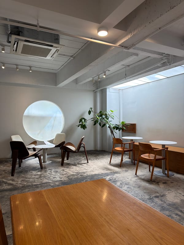 Quiet morning at a minimalist cafe with drinks in focus