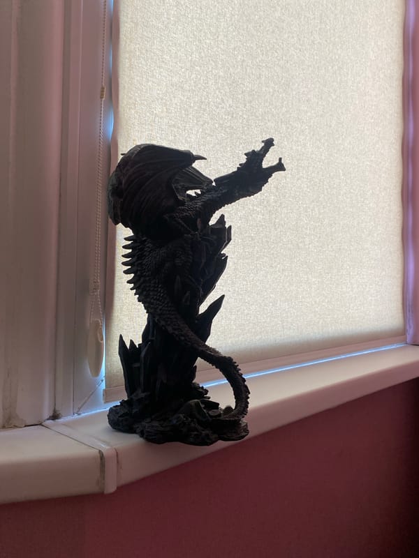Dragon figurines and art objects around a Chișinău apartment