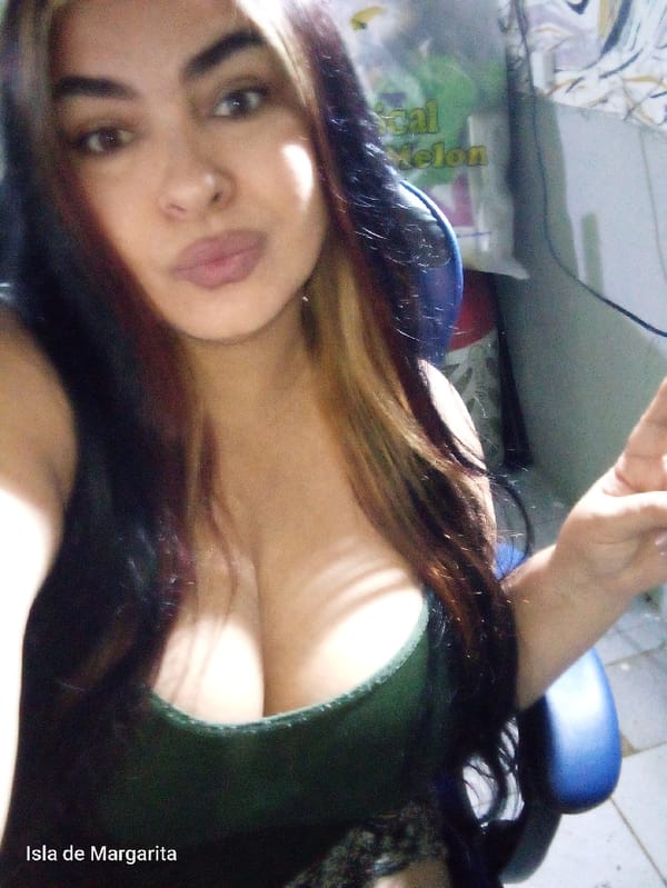Woman takes selfie session in Juan Griego home