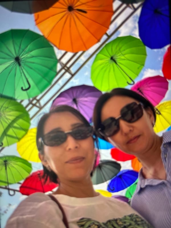 Colorful umbrella canopy installation in rural Kazakhstan