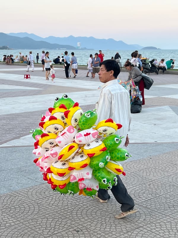 Daily Life Unfolds Along Nha Trang's Coastal Promenade and Beaches