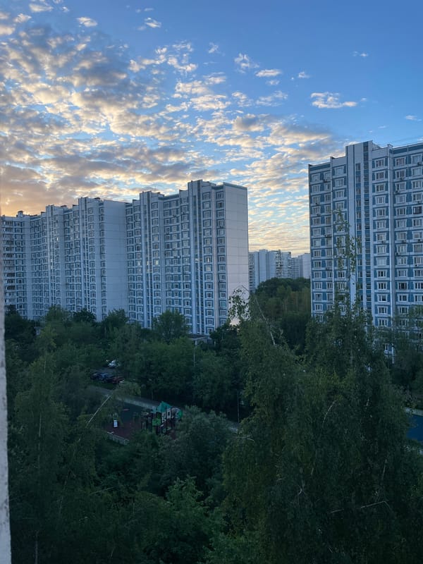 Dusk clouds photographed over Moscow residential area