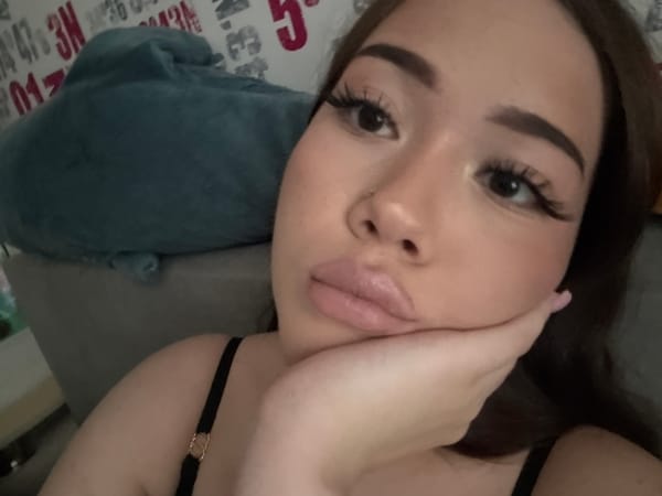 Woman captures selfies and roses in Russian apartment