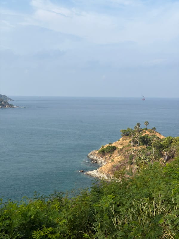 Hazy ocean view captured from cliff in Rawai, Thailand