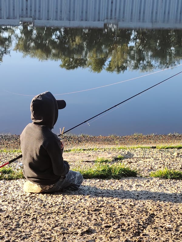 Father and son fishing trip on Kama River, Russia