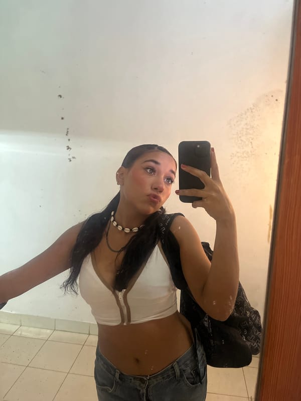 Mirror selfies and a collectibles shop in Pampatar, Venezuela