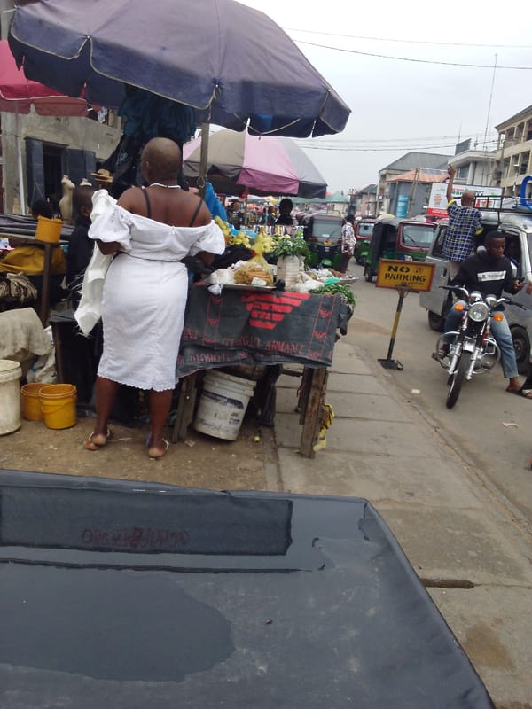 Everyday street life documented in Aba, Nigeria commercial district