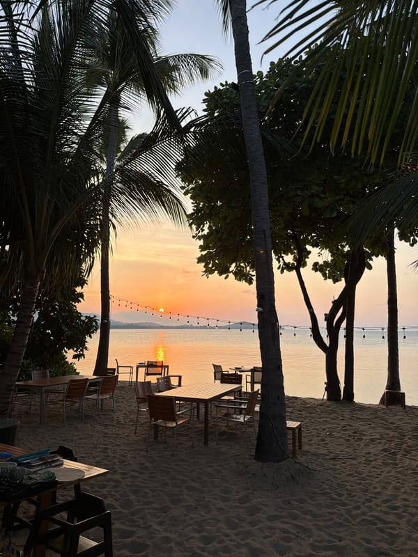 Sunset dining setup captured at Baan Bo Phut beach