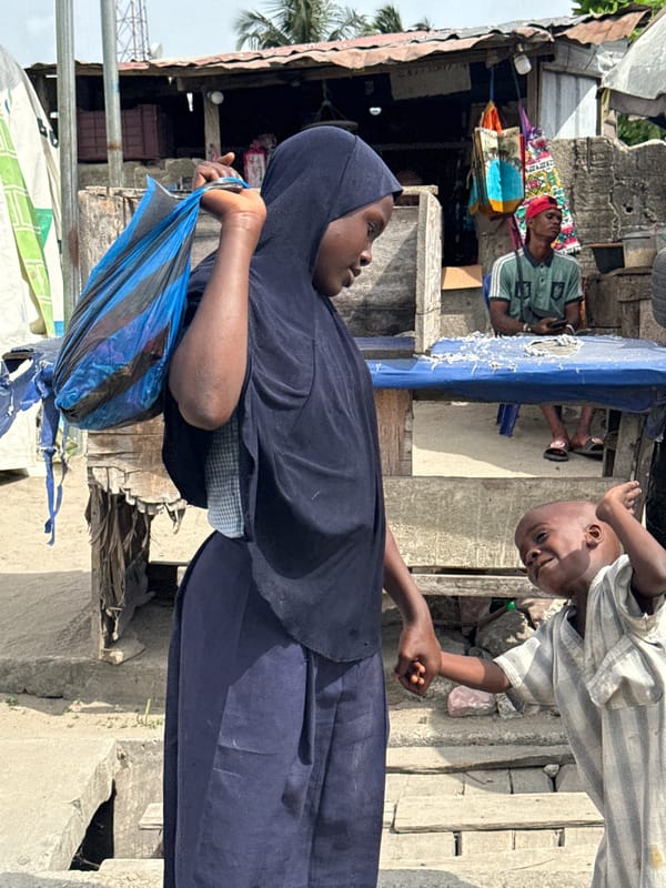 Daily commerce and community interactions observed in Ado, Nigeria