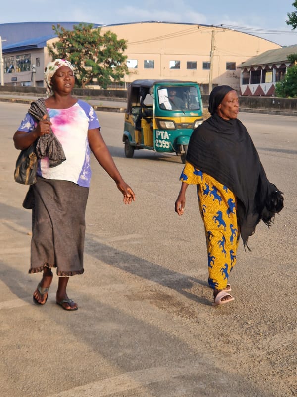 Morning street life in an African urban neighborhood