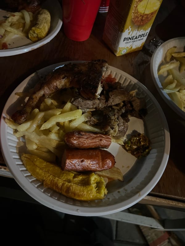 Mixed grill plate on a wooden table in Dar es Salaam