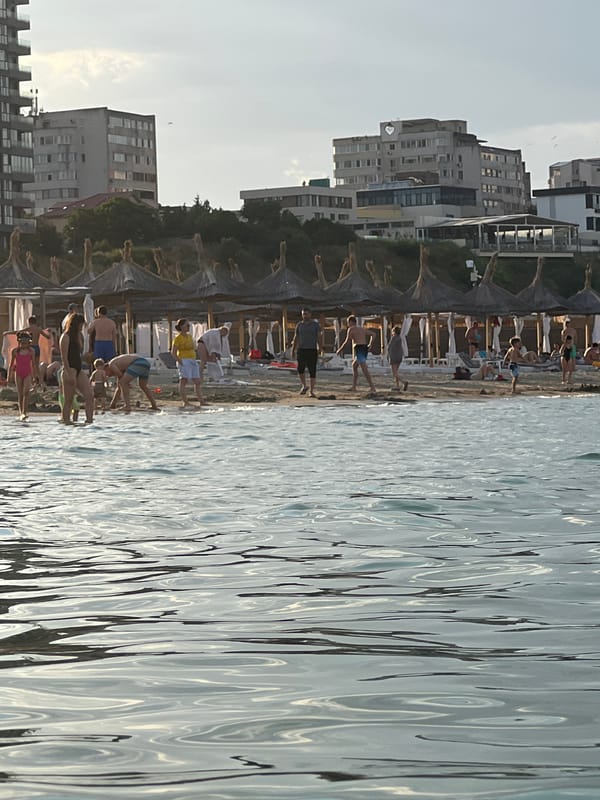 Crowded Black Sea beach in Constanța on a sunny July afternoon