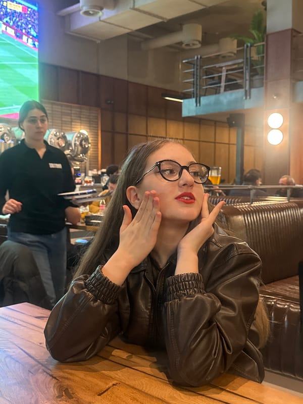 Woman dines on Georgian dumplings in Tbilisi restaurant