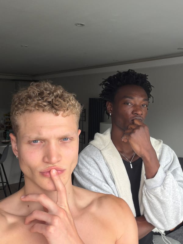 Two young men photographed in London apartment