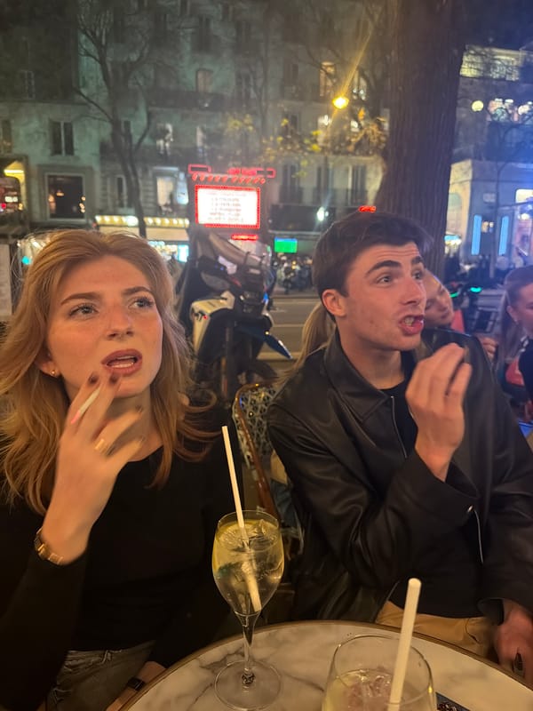 Ordinary street life documented across central Paris Wednesday afternoon