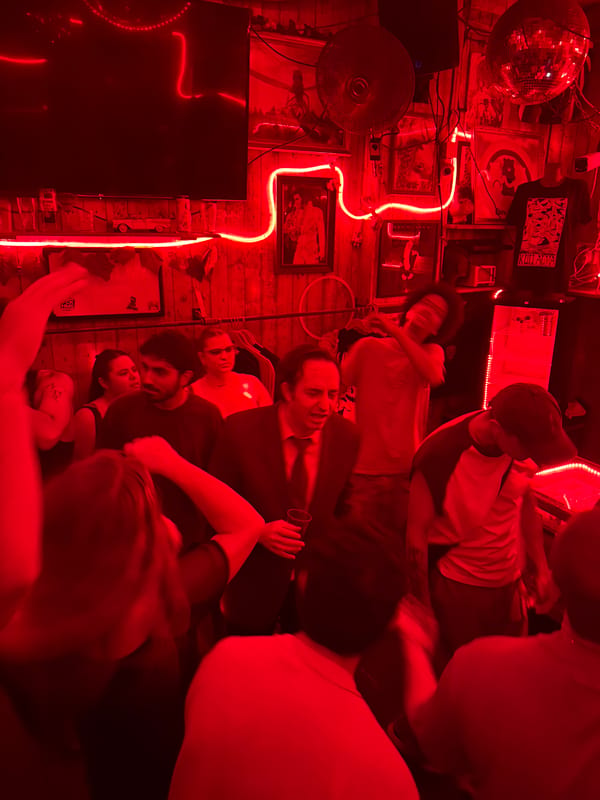 Red-lit Tel Aviv bars draw crowds during midnight hours