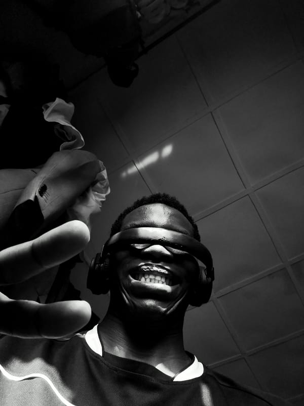 Person photographed in playful blindfolded poses in Keffi