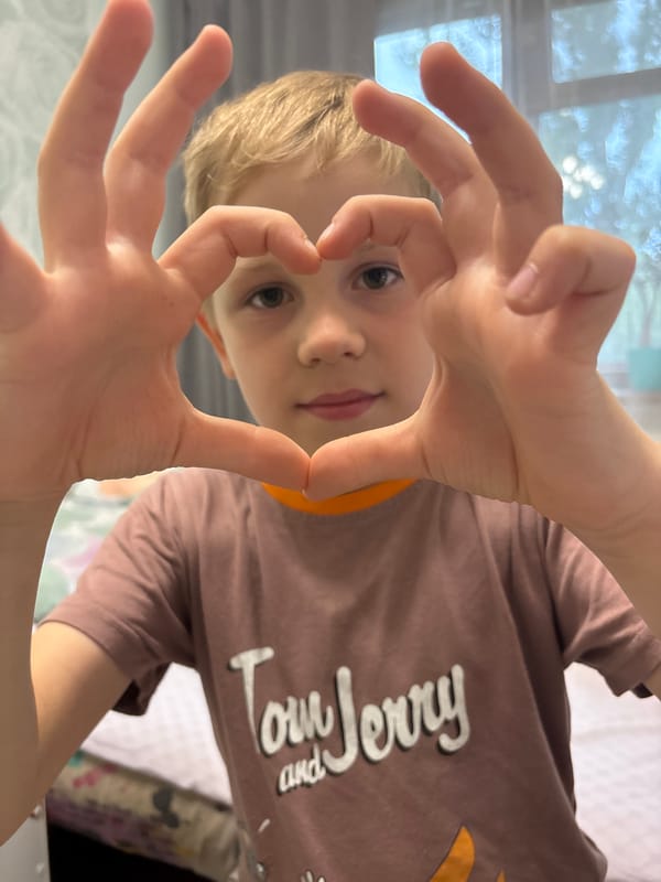 Heart hands and a close selfie, shot back to back