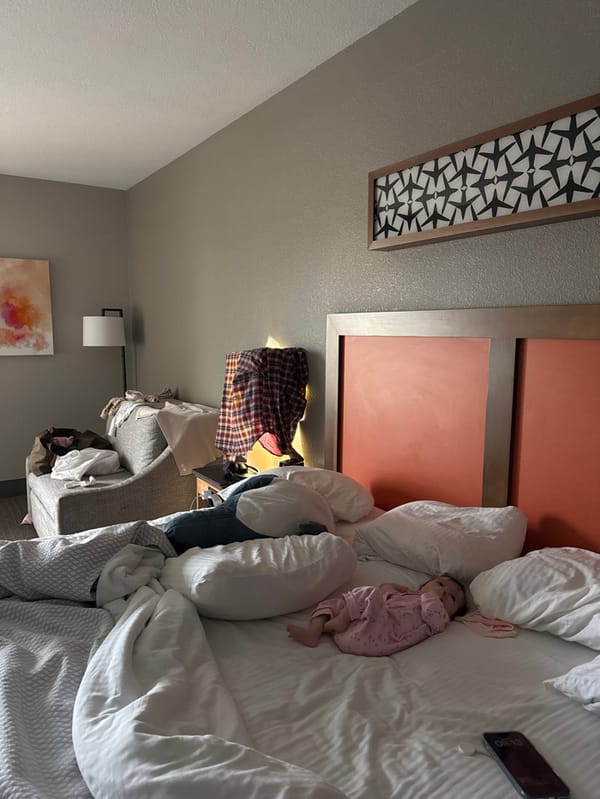 Infant in pink pajamas observed in disheveled Dallas hotel room