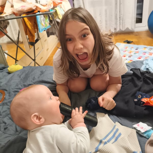 Domestic moments: child play and coffee break captured