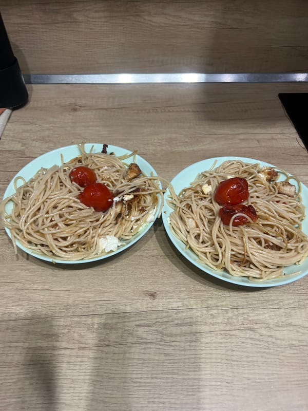 Spaghetti dinner photographed on wooden table in Plovdiv