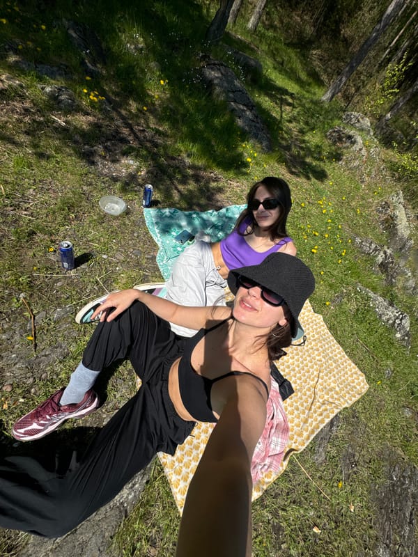 Women enjoy sunny morning outdoors in Krasnoyarsk park