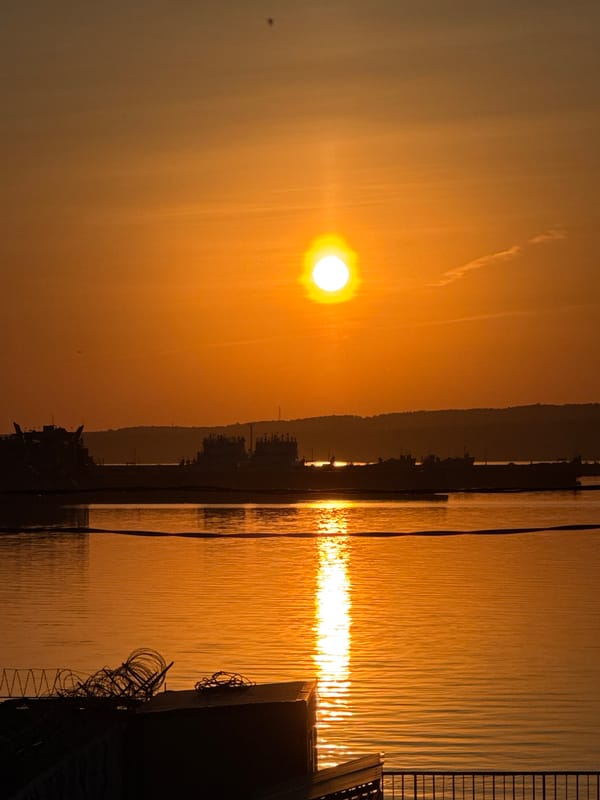 Family enjoys sunset beach outing in Chaikovsky, Russia