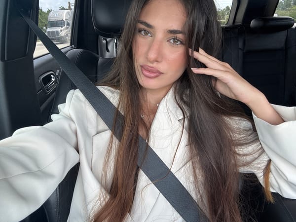 Woman in white blazer spotted in car in Miami