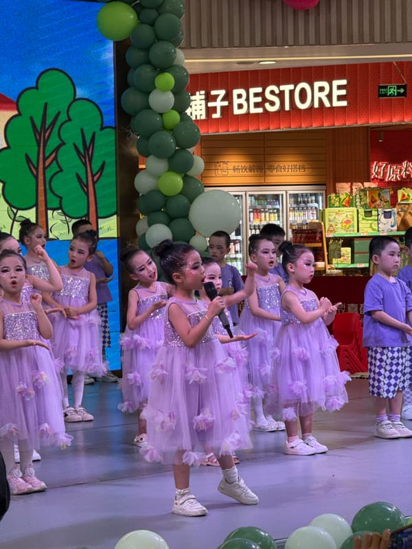 Children perform dance routine at Jiulongpo shopping mall