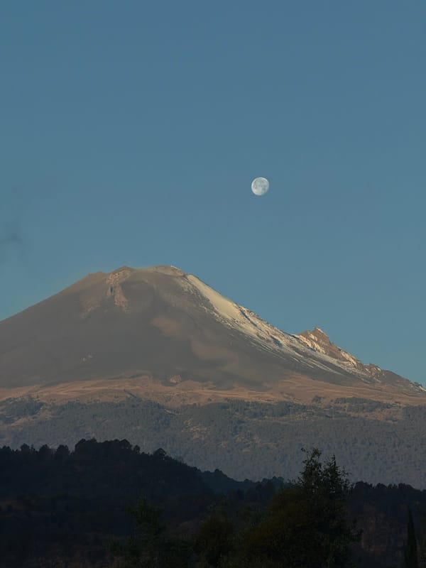 Snow-capped Popocatépetl volcano observed near Santiago Xalitzintla, Mexico