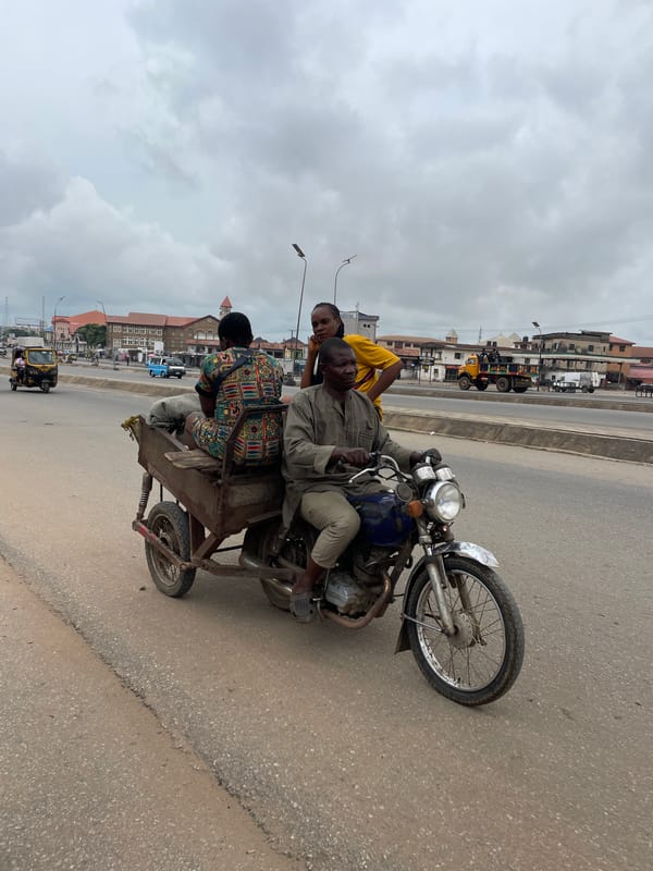 Goods on the move through a busy African urban market