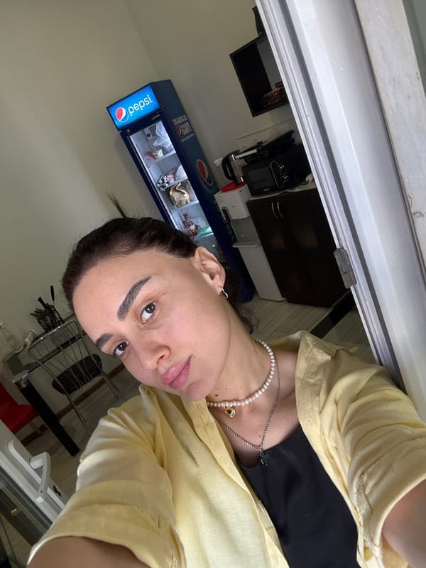 Woman in yellow photographed at multiple Tbilisi locations