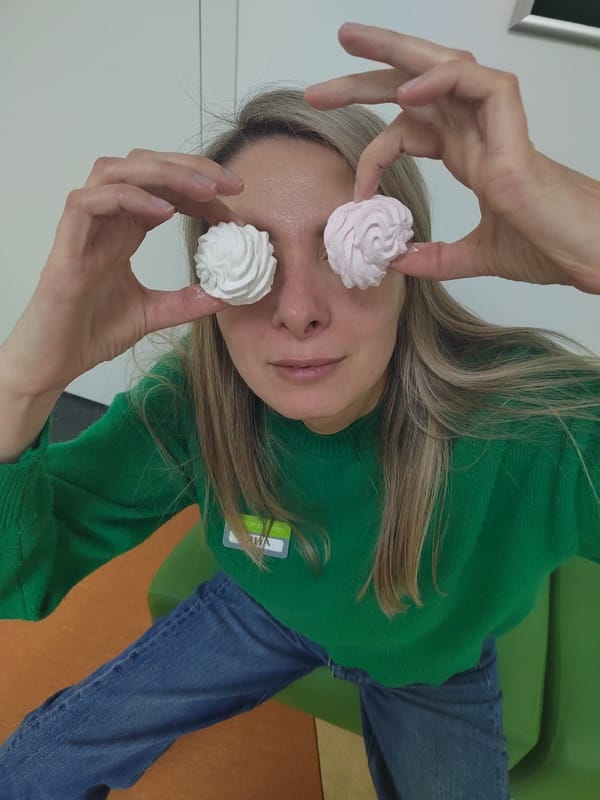Woman enjoys meringue snack in Votkinsk morning scene