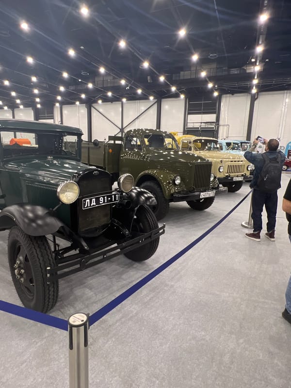 Classic car exhibition showcases vintage automobiles indoors