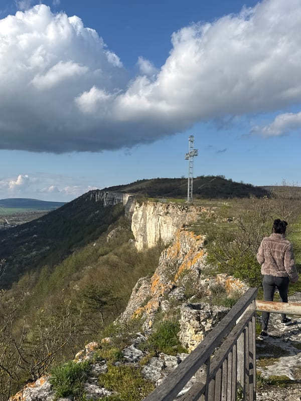 Woman visits scenic overlook with Bulgarian flag in Provadia