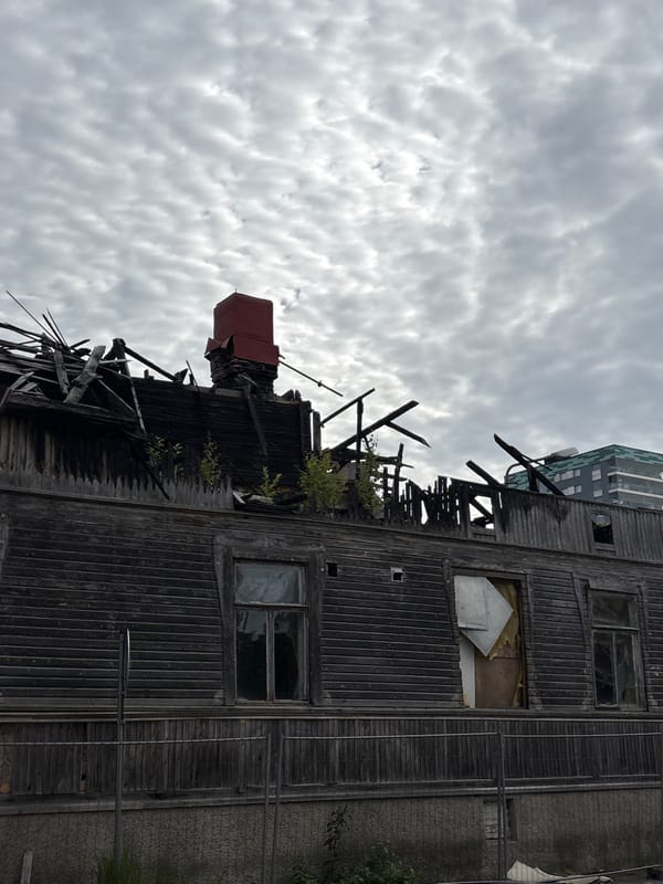 Fire damage, campus architecture, and cloudy skies in Pori