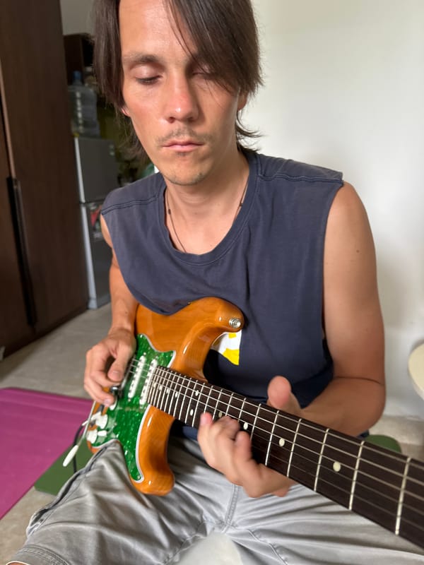 Guitar, pancakes, a poodle, and Da Nang streets on a Tuesday morning