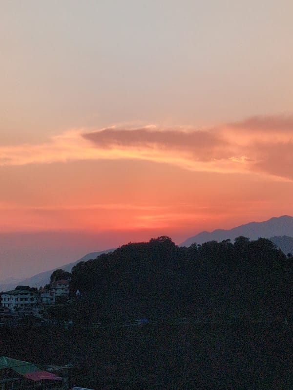 Sunset views across Naddi's rolling hills and residential clusters