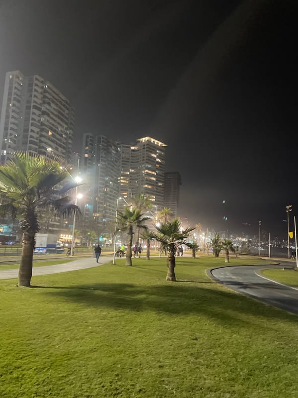 Nighttime family activities observed in Iquique, Chile playground area