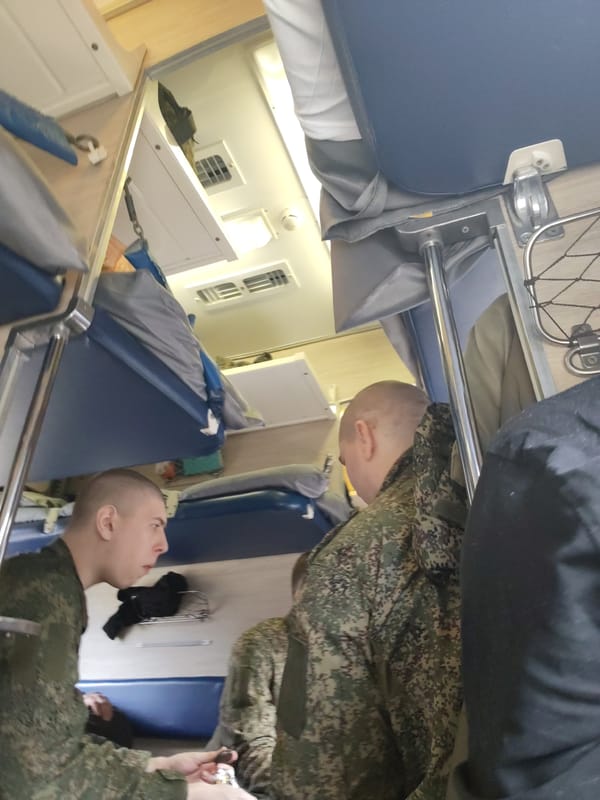 Two men in green uniforms spotted on Russian train