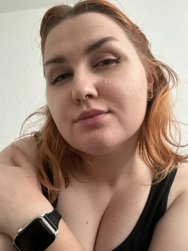 Relaxed indoor moment, selfies and downtime on a couch.