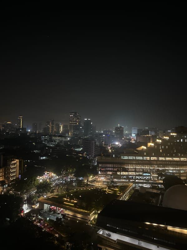 Nighttime aerial views capture illuminated Central Jakarta cityscape