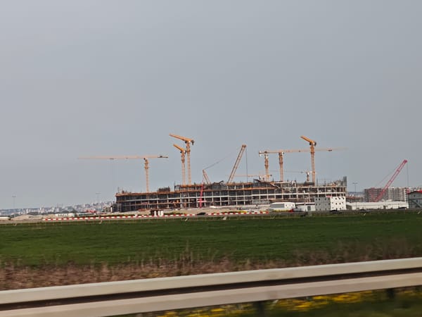 Construction project with yellow cranes documented in Surcin, Serbia