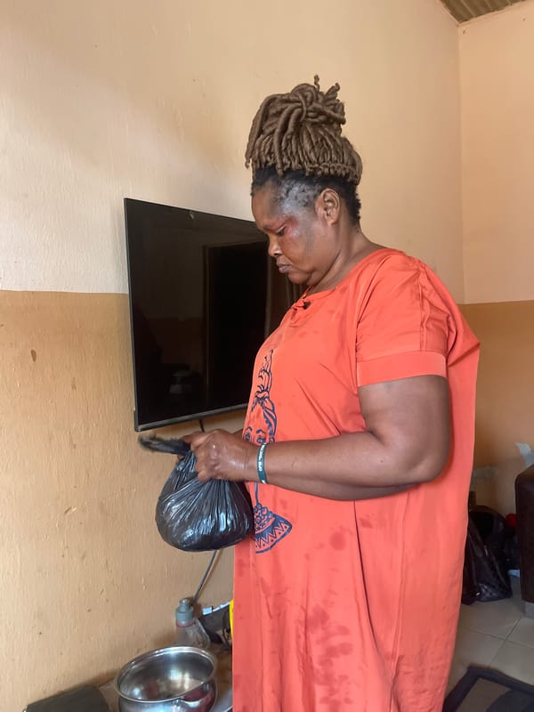 Woman in orange dress spotted with bag in Muchiya