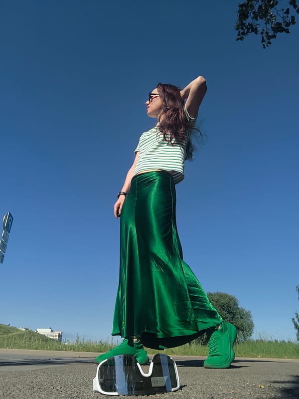 All-green outfit shoot on a sunny afternoon in Riga