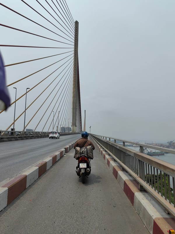 Morning commute captured on Bai Chay Bridge, Vietnam
