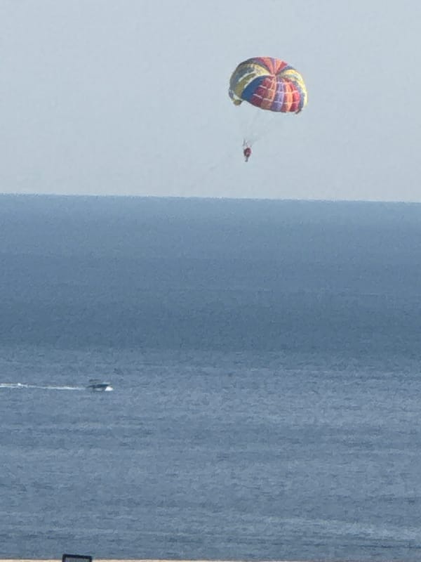 Parasailing off the Montenegrin coast on a sunny afternoon