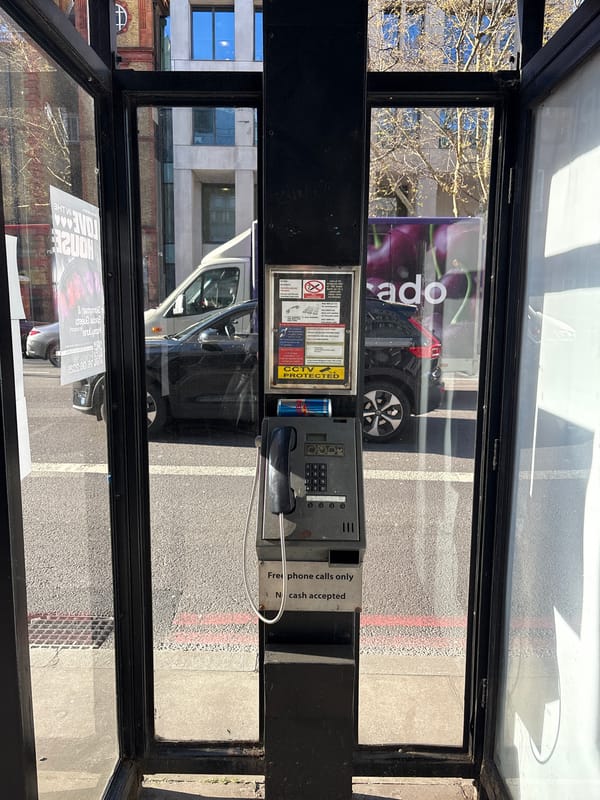 Traditional London phone booth offers free calls only