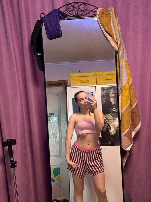 Woman Takes Mirror Selfie in Прикамский, Russia