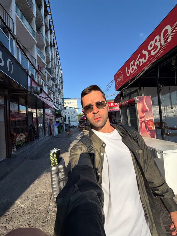 Street scenes in Tbilisi: selfie with luggage, bench break nearby